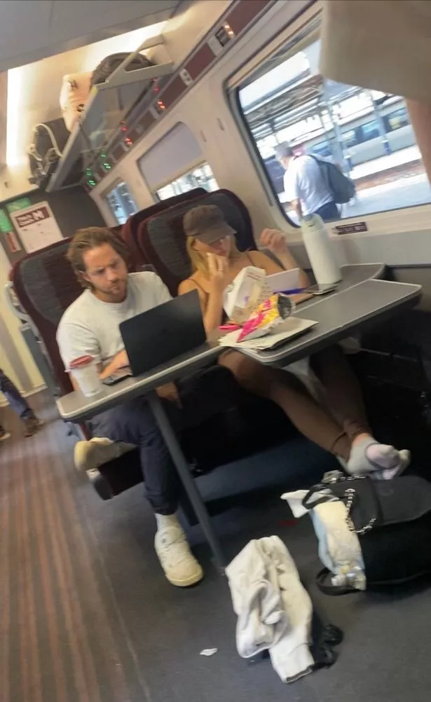 Margot Robbie and Tom Ackerley sat in first class