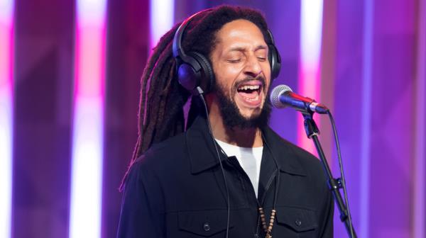 Julian Marley sings onstage