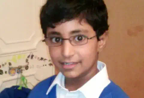 Family photo Karanbir Cheema in his school uniform